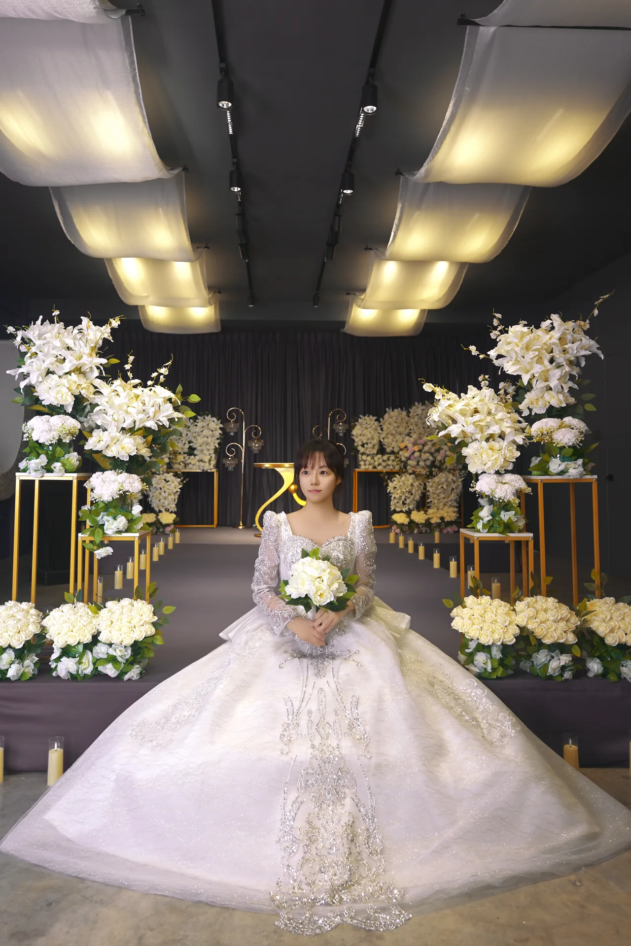 Bride seated in a Korean wedding hall